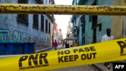 Una cinta amarilla de la policía prohíbe el paso a un barrio de La Habana. (Yamil Lage/AFP/Archivo)