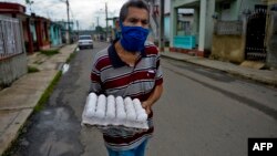 Escena captada el 18 de junio en una calle de San José de las Lajas, en la provincia de Mayabeque (Archivo/Yamil Lage/AFP).